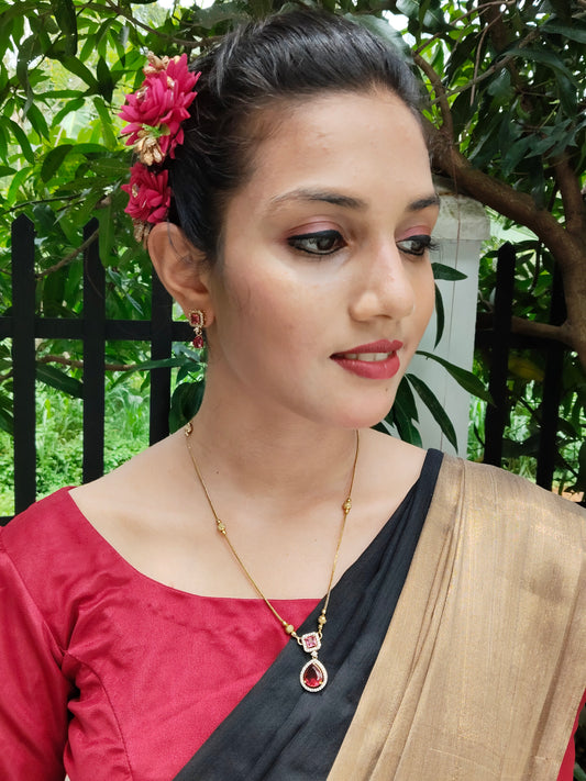 Rasika Simple Mid length AD Stoned Antique Chain with Pendant