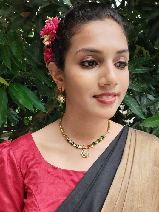 Pushpavalli Floral Designed Multi Colored AD Stone Necklace Set in Antique Gold
