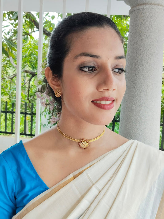 Indulekha Simple and Beautiful Traditional Choker Set in Antique Gold Finish