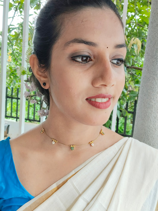Kshamika Simple and Trendy Invisible Necklace or Choker in Emerald and Uncut Diamond without Earring