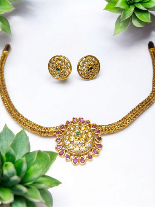 Indulekha Simple and Beautiful Traditional Choker Set in Antique Gold Finish