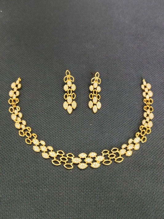 Golden Leaves Premium Quality Simple and Stylish 22k Gold Plated Necklace Set with AD Stone