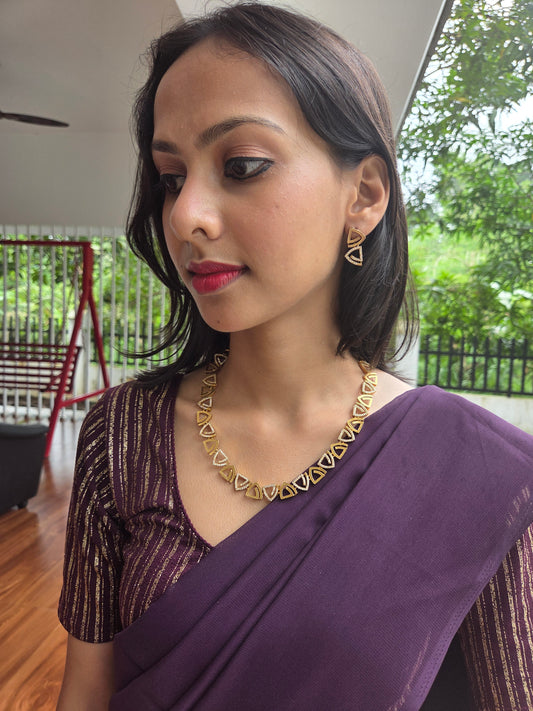 Trikonika Premium Quality 22k Gold Plated Antique Shade Stylish and Trendy Mid length AD Stoned Necklace Set