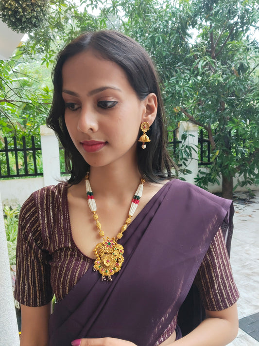 Kanakabhoomi Premium Quality Antique Gold Mat Finish Elegant and Beautiful Mid Length Pearl Haram/Chain with Earring Set