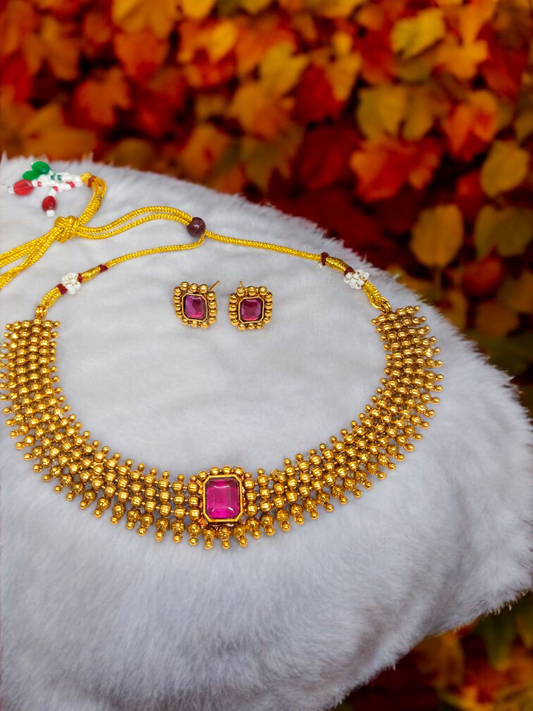 Swaralipi Mat finish Antique Shade Traditional and Festive Beautiful Necklace Set in Ruby Stone